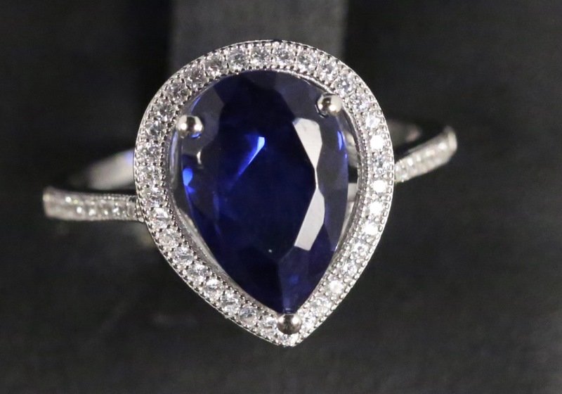 18 KT OVER S.S. 4.44 CT SIM. SAPPHIRE/DIAMOND RING (1 of 2)