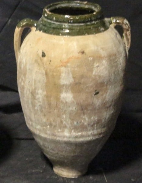 ANTIQUE TURKISH TERRACOTTA OLIVE JAR/100-400 YEARS: ANTIQUE TURKISH TERRACOTTA OLIVE JAR. 100-400 YEARS OLD. Height: 24 in. by Width: 16 in. by Depth: 16 in.