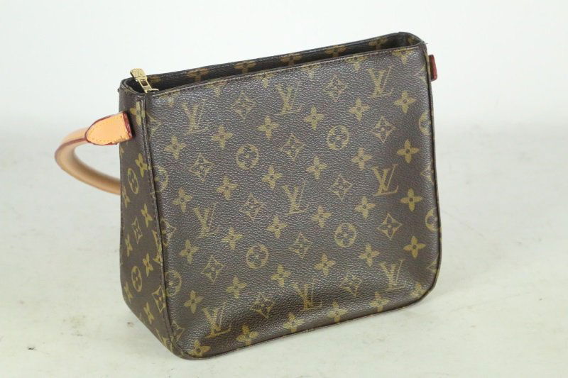 LOUIS VUITTON MONOGRAM CANVAS BAG WITH CAMEL  HANDLE. (1 of 2)