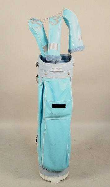 BURTON GOLF BAG WITH THREE CLUBS: BURTON GOLF BAG WITH THREE CLUBS. Height: 32 in. by Width: 9 in. by Depth: 9 in.