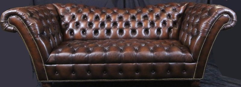 BUTTON-TUFTED BROWN LEATHER SOFA: BUTTON-TUFTED BROWN LEATHER SOFA. Height: 34 in. by Width: 89 in. by Depth: 36 in.