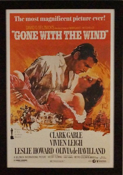 FRAMED POSTER OF "GONE WITH THE WIND": FRAMED POSTER OF "GONE WITH THE WIND". Height: 41 1/2 & 35 in. by Width: 29 1/2 & 23 1/2 in.