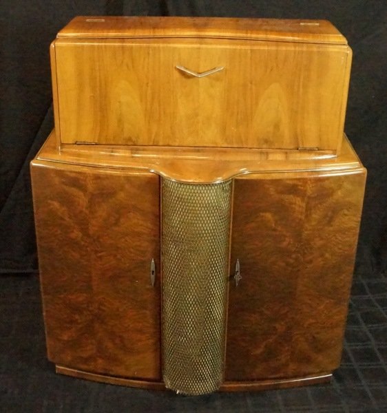 VINTAGE ART DECO BAR CABINET: VINTAGE ART DECO BAR CABINET WITH PULL-OUT DRAWER REVEALING MIRROR, ILLUMINATED INTERIOR. Height: 43 in. by Width: 36 in. by Depth: 18 in.