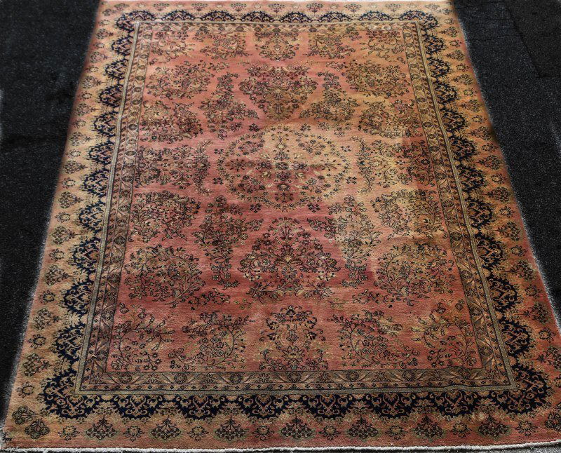 HAND WOVEN PERSIAN ROSE & BLUE RUG: HAND WOVEN PERSIAN ROSE & BLUE RUG. Height: 9 ft. 7 in. by Width: 6 ft. 6 in.