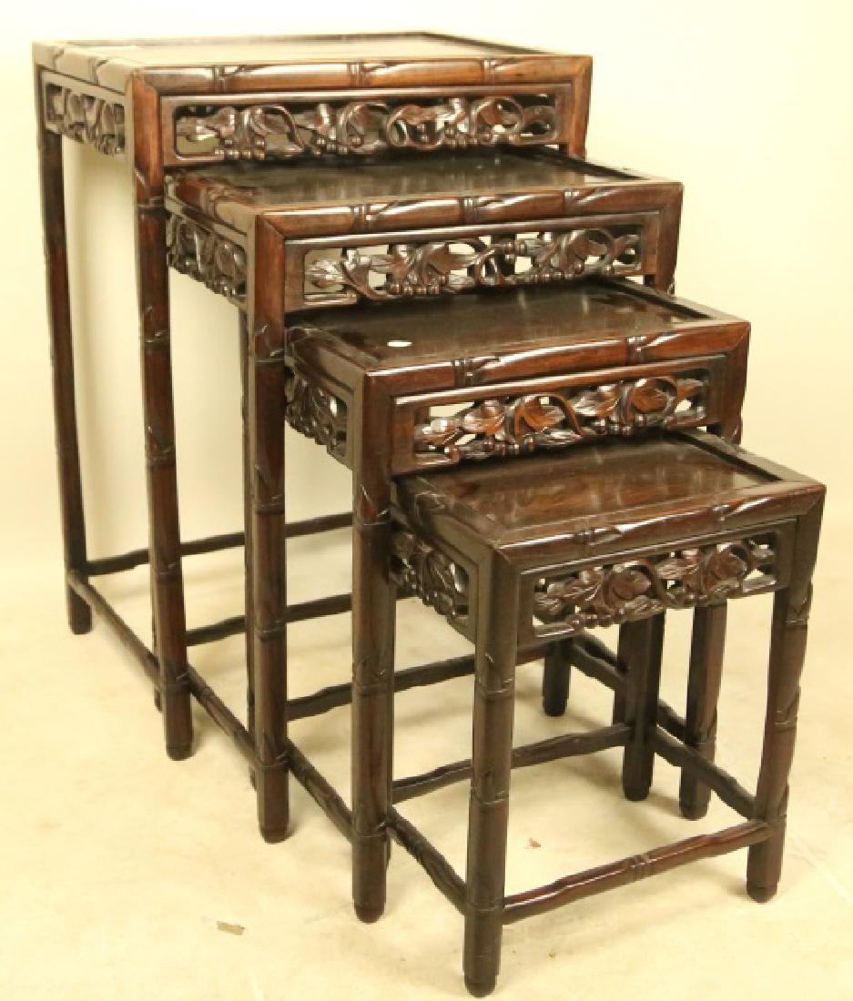 FOUR-PIECE CARVED CHINESE ROSEWOOD NEST OF TABLES (1 of 2)