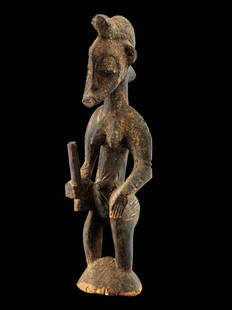 Figur, "tugubele" (no reserve price): 24 Figur, "tugubele" (no reserve price) Senufo, Côte d’Ivoire Gesockelt (base included) Holz. H 23 cm. Provenienz: Nachlass René David (1928-2015), Zürich. tugubele-Figur. Symbol für die kleinen