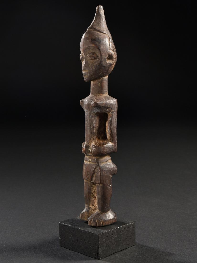 A LULUA "NKISHI" FIGURE (1 of 14)