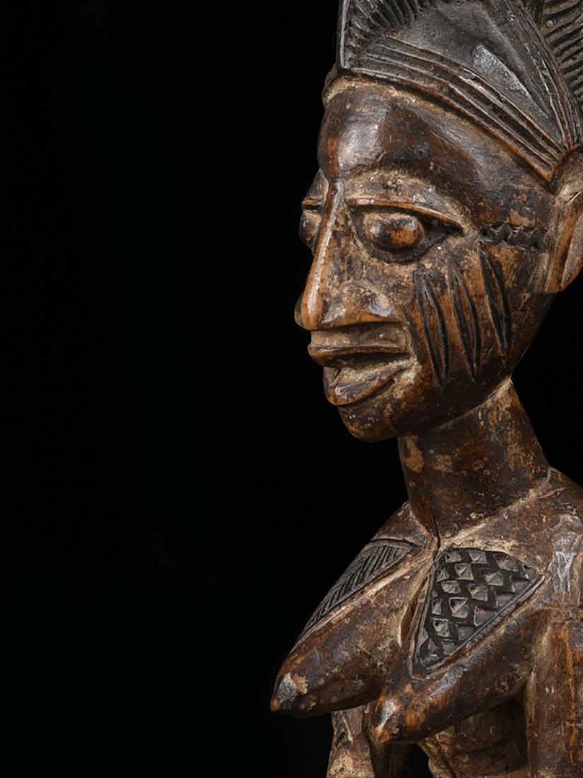 A Yoruba Miniature of a Bowl Bearer, "agere ifa" (1 of 13)