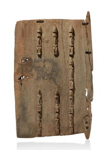 A Dogon Door, "dégé tan": Tür, "dégé tan" Dogon, Mali Ohne Sockel / without base Holz. H 79 cm. B 50 cm. Provenienz: - Henry Bing (1888-1965), Paris (1920/25). - Mrs. H. Bing, Cagnes-sur-Mer (1975). - Paolo Morigi,