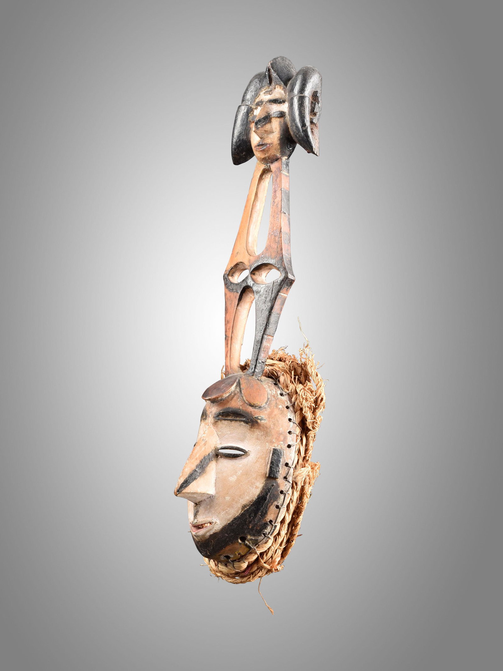 An Igbo-Afikpo Mask, "opanwa": Maske, "opanwa" Igbo-Afikpo, Nigeria Ohne Sockel / without base Holz. H 42 cm. Provenienz: Helmut und Marianne Zimmer, Zürich. Publiziert: Cole, Herbert M. / Dierking, Dierk (Hgb.) (2012). Invention 