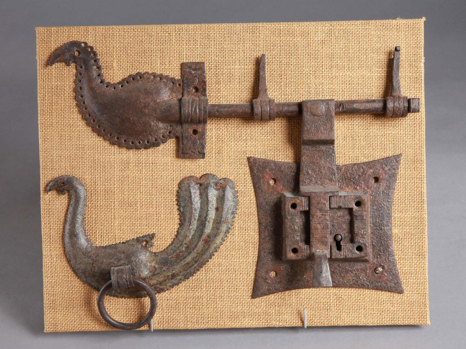 An Indian Door Lock and Fitting: Tür-Schloss und -Beschlag Indien Mit Rahmen / with frame Eisen. H 40 cm. B 33 cm. L 42 cm. Provenienz: Helmut und Marianne Zimmer, Zürich. Anlässlich mehrerer Indien-Reisen in den 1970er Jahren vor