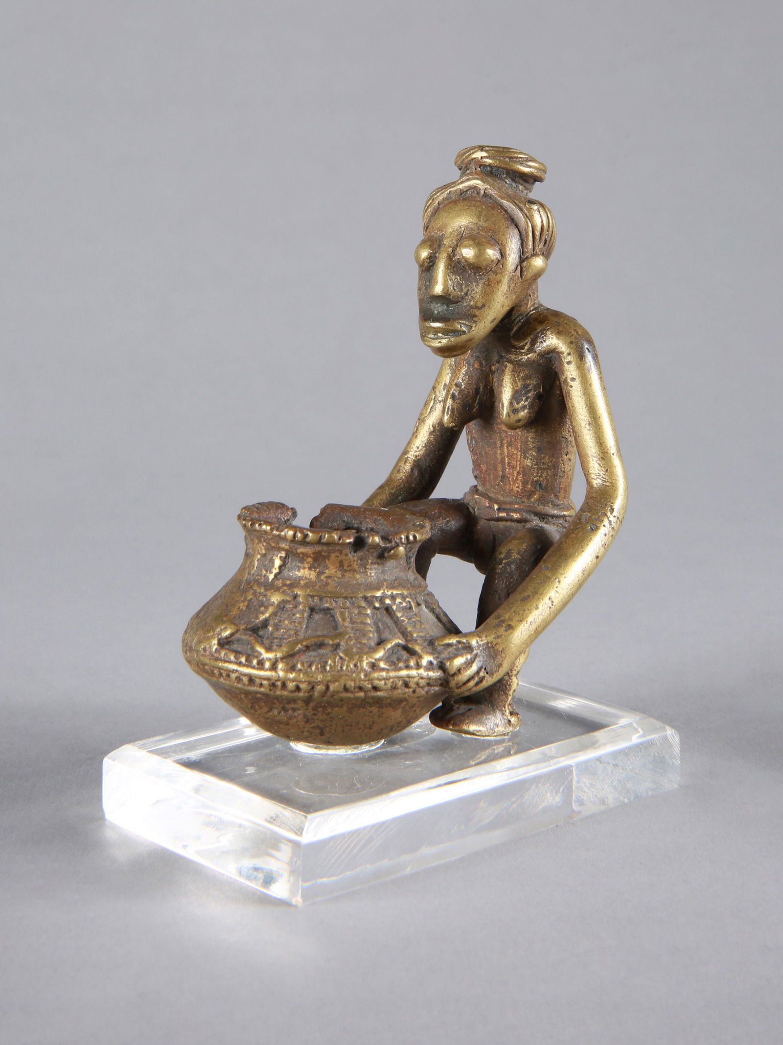 An Akan Miniature Figurine holding a Bowl (1 of 11)