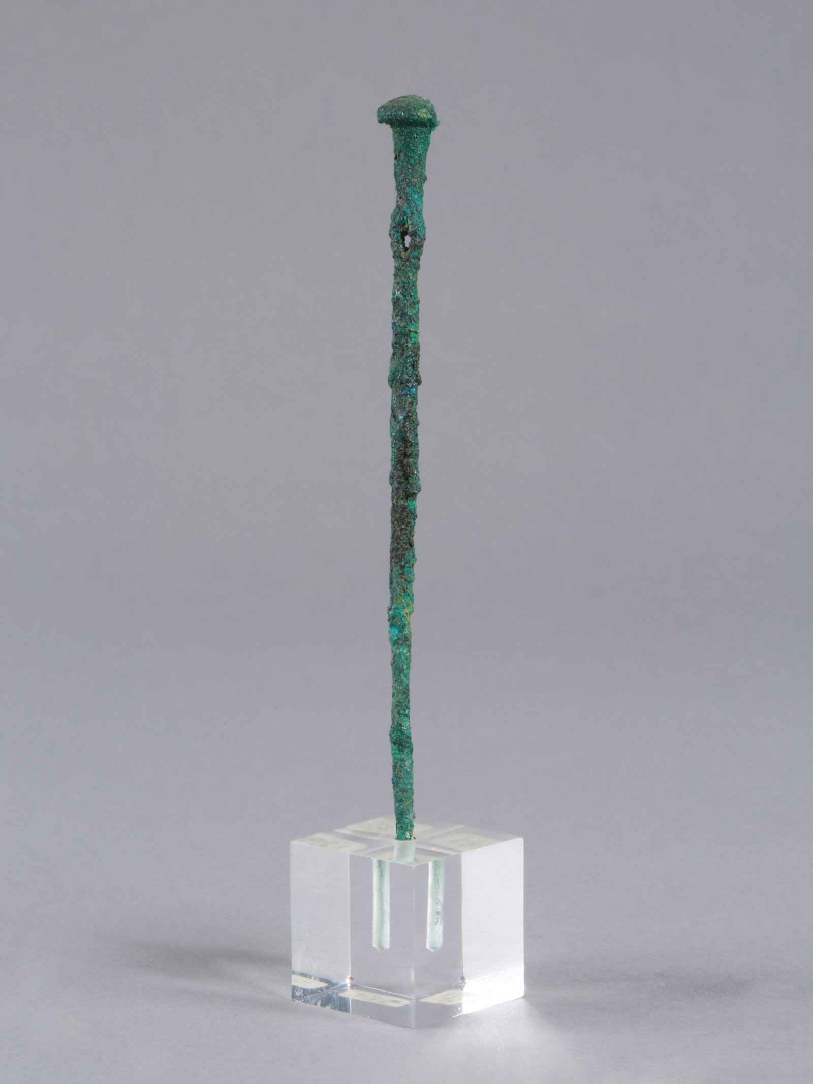 A Central European Bronze Pin: Bronzenadel Mitteleuropa Mit Sockel / with base Bronze. H 11 cm. Provenienz: Nachlass Madeleine und Jean-Jacques Keller (bis 1980 Abidjan, danach Rheinfelden). CHF 20 / 50 EUR 17 / 43