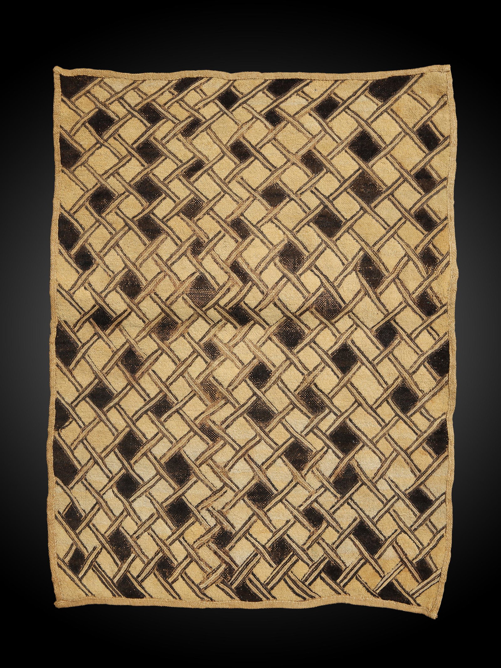 A Kuba Cut-Pile Embroidery Fabric: Raphia-Plüschgewebe Kuba, DR Kongo Ohne Sockel / without base Raphia. B 52 cm. L 64 cm. Provenienz: René David (1928-2015), Zürich. Ausgestellt: Musée International du Golfe de Guinée, Togo (2005
