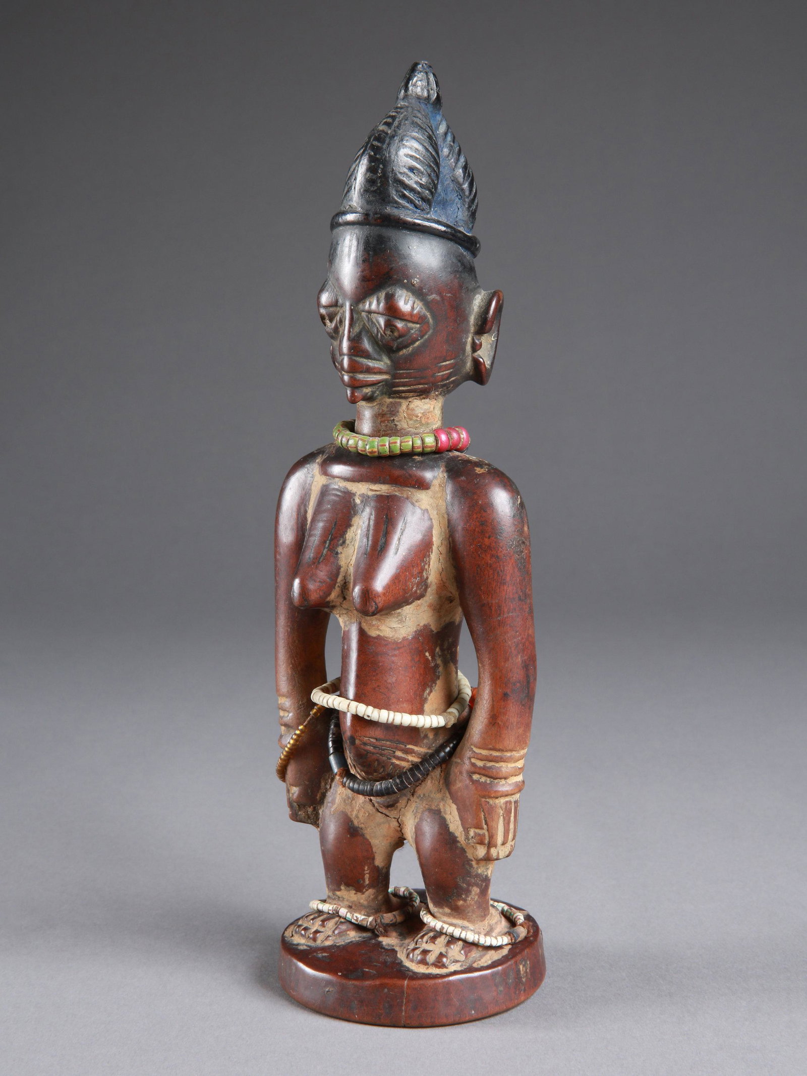 A Yoruba Twin Figure, "ere ibeji" (1 of 13)