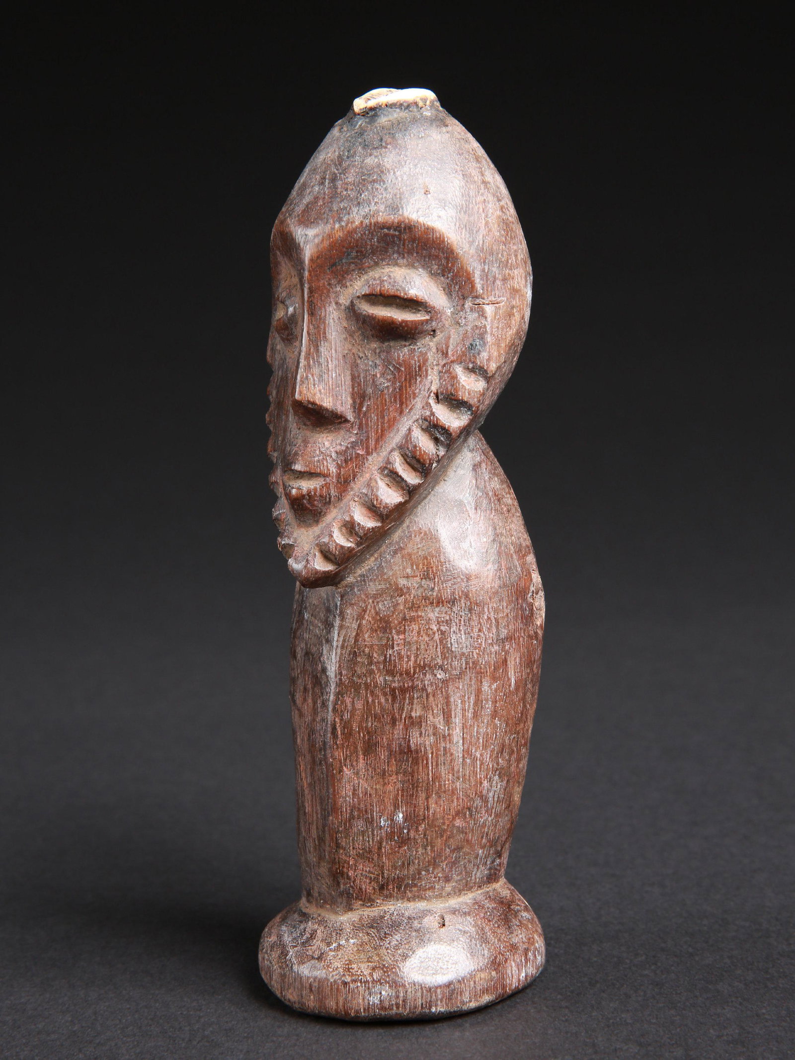 A Lega Figure, "kalimbangoma" (1 of 11)