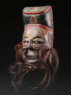 A Chinese Nuo Mask, "tudigong": Nuo-Maske, "tudigong" China Ohne Sockel / without base Holz, Echthaar. H 26 cm. Provenienz: Schweizer Privatsammlung, Neuenburg. Nuo, also called the "nuo sacrifice" or "nuo ceremony," was originally