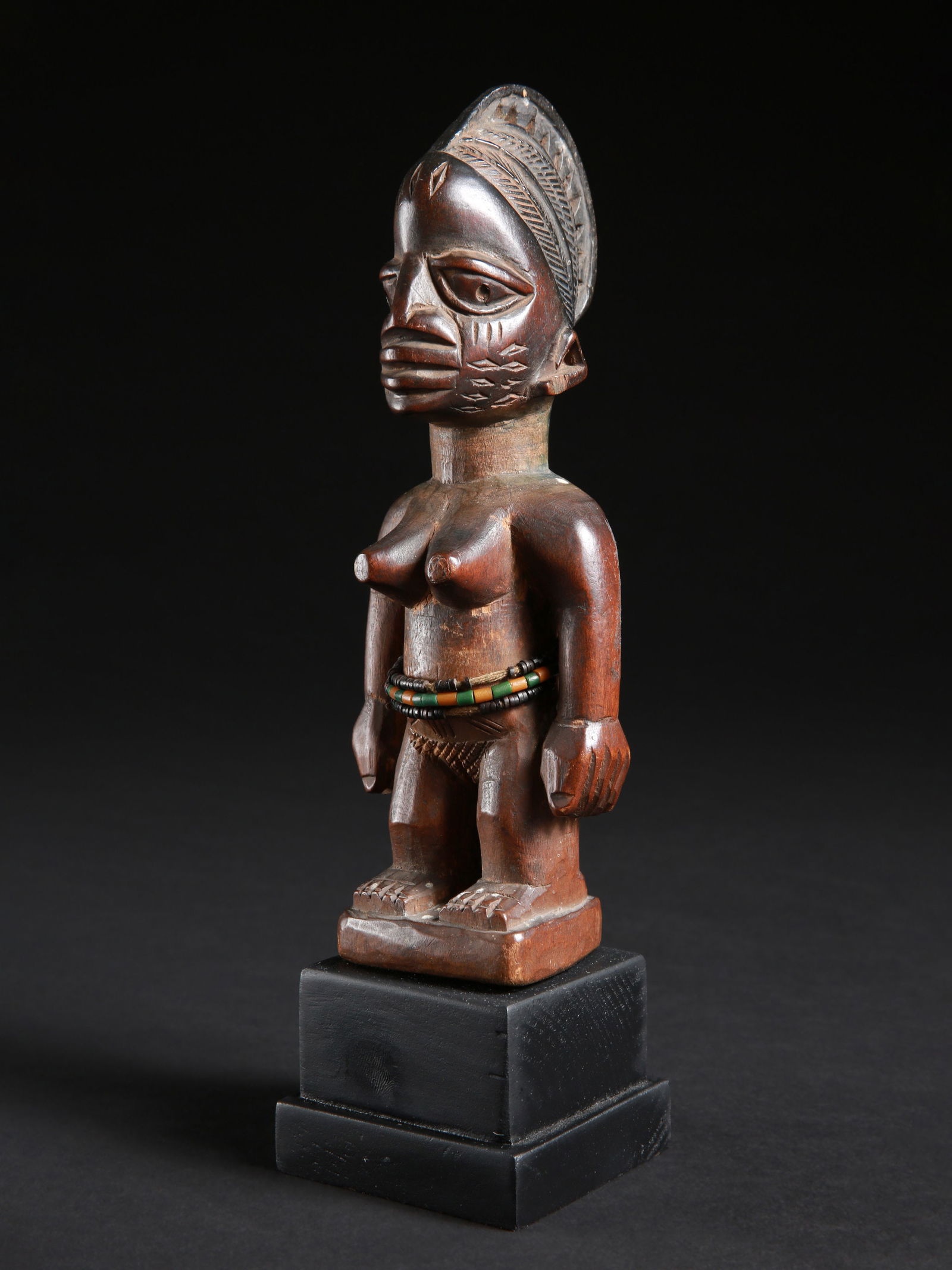 A Yoruba Twin Figure, "ere ibeji" (1 of 12)