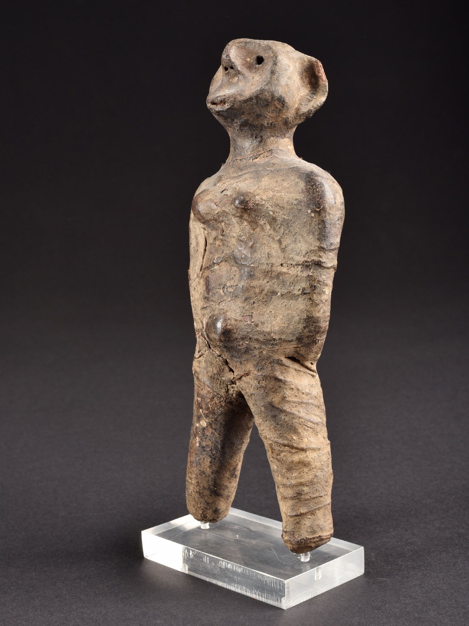 A Pare Anthropomorphic Miniature Terracotta Figure (1 of 4)
