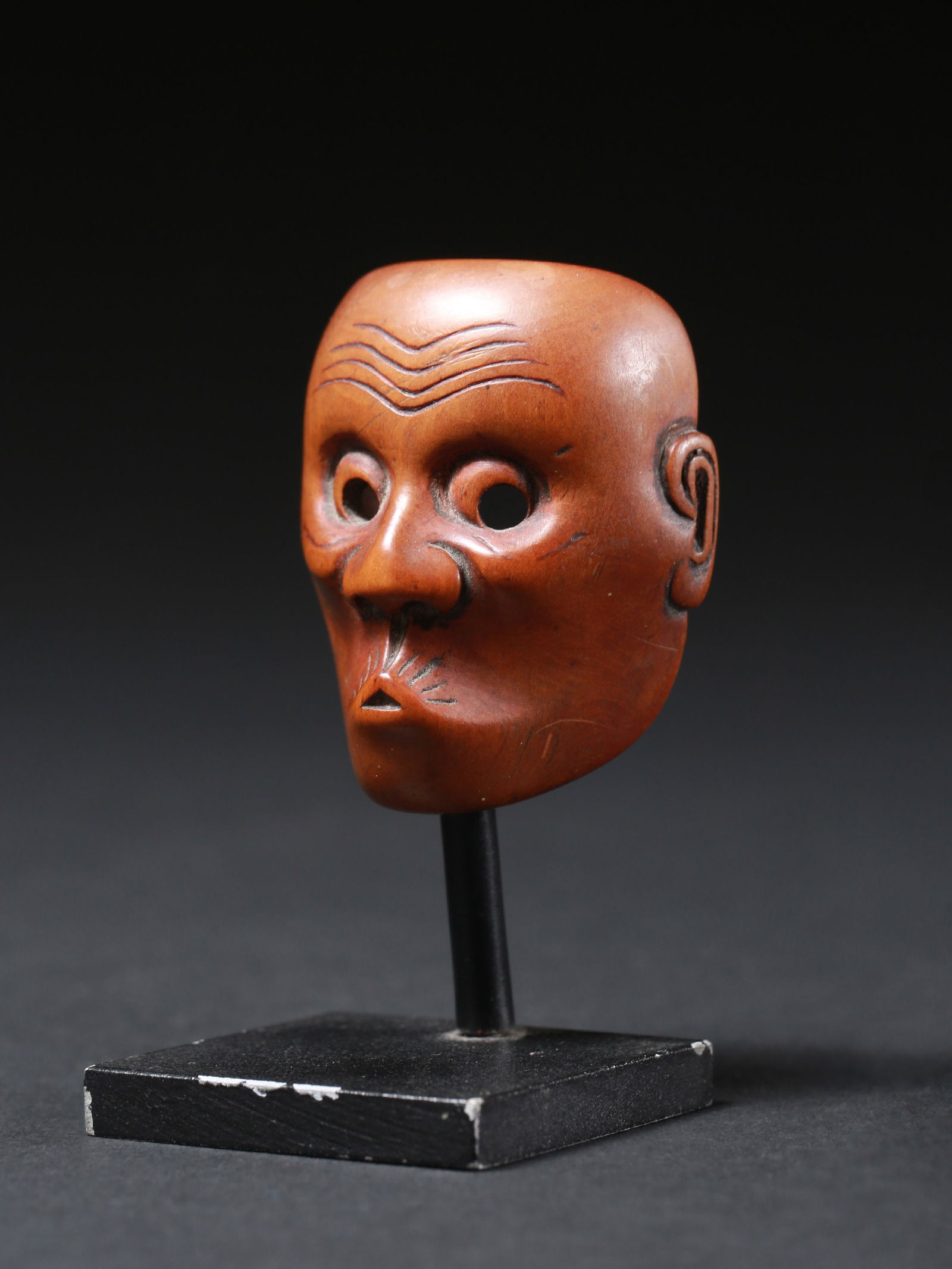 A Netsuke Miniature Mask of Usobuki from the Kyōgen theater (1 of 7)