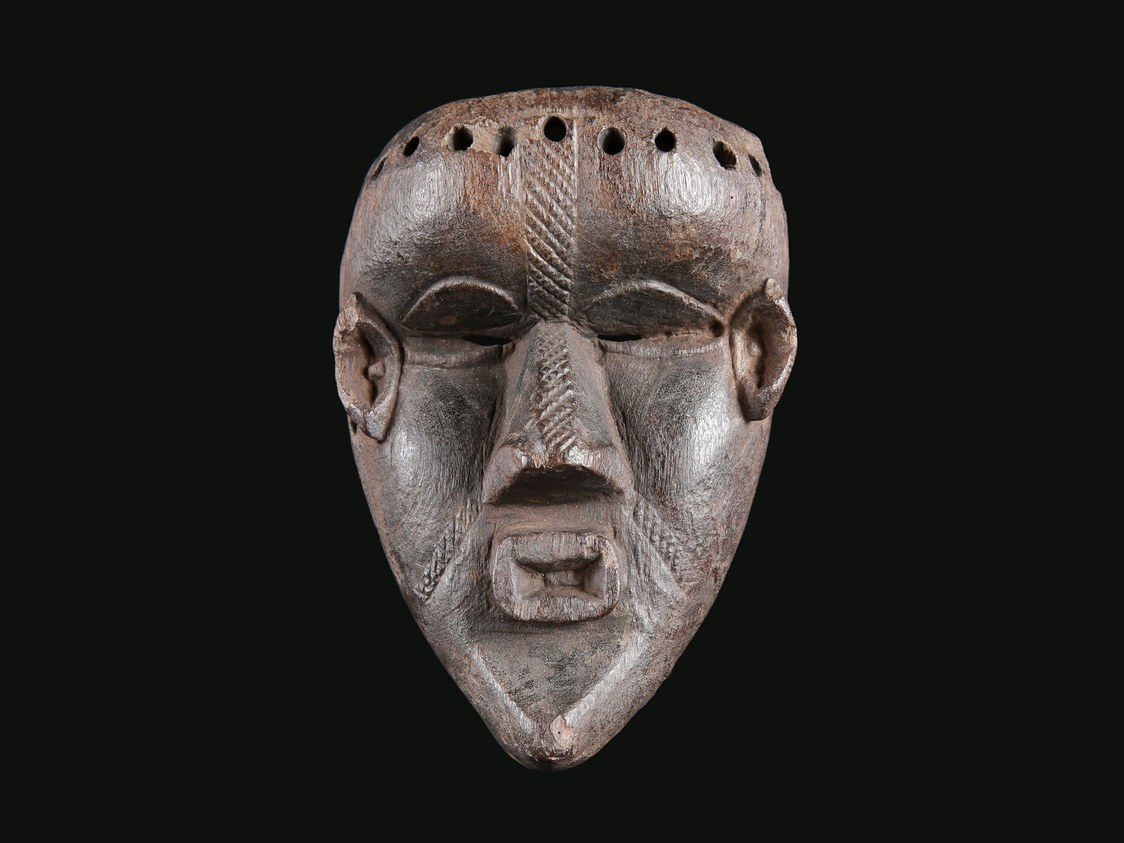 A Bassa Miniature Mask, "ma go" (1 of 7)