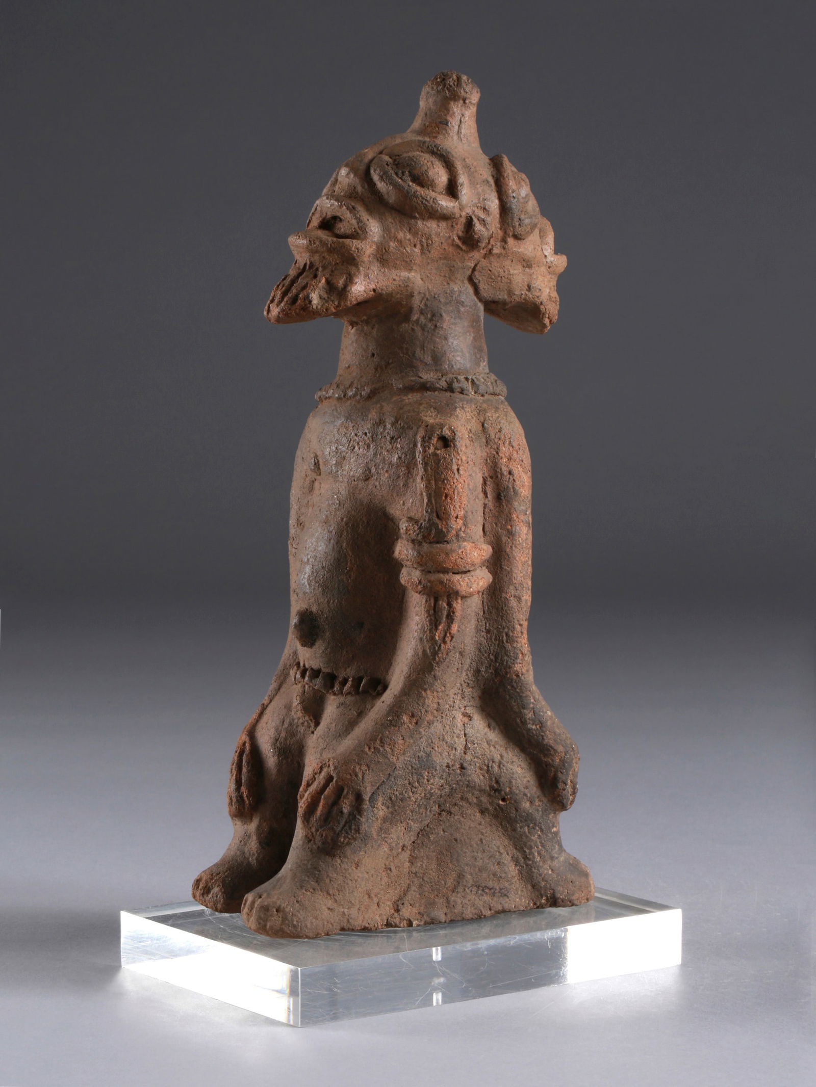 A Koma-Bulsa seated janiform Figure, "kronkronbua" (1 of 15)