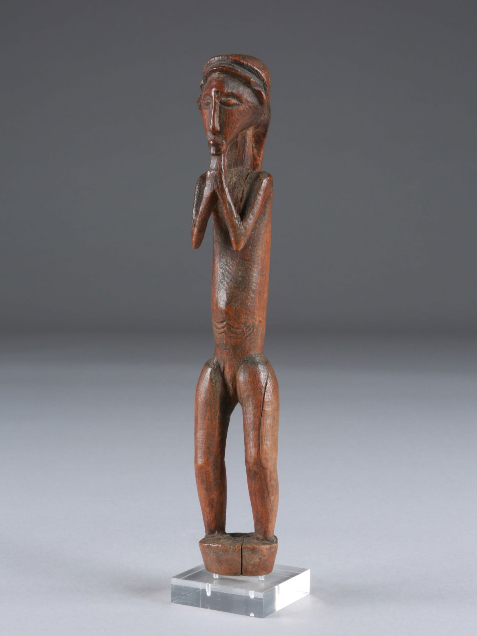 A Sikasingo (?) Figure. Upper part of a staff (?) (1 of 9)