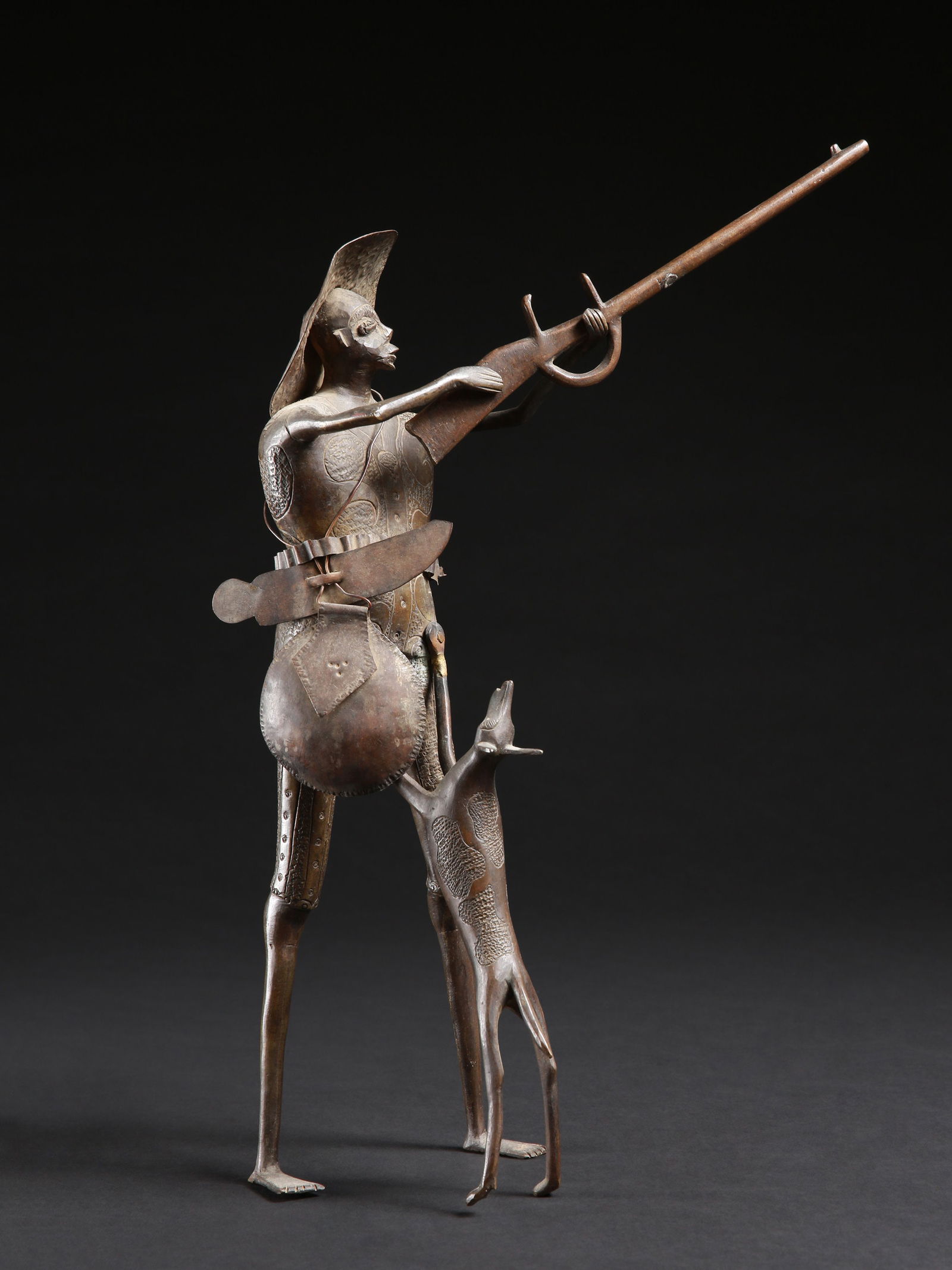 A Fon Bronze Figure of a Hunter with Dog (1 of 8)