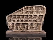 A Kongo one-sided Stone Relief with figurative Scenes