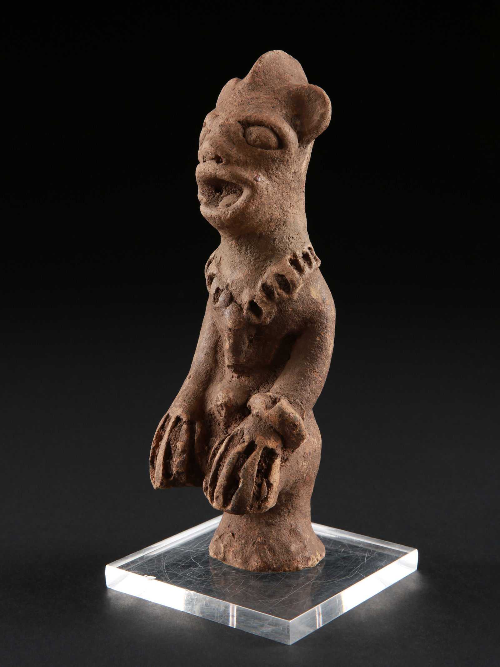 A Koma-Bulsa seated Terracotta Figure, "kronkronbua" (1 of 12)
