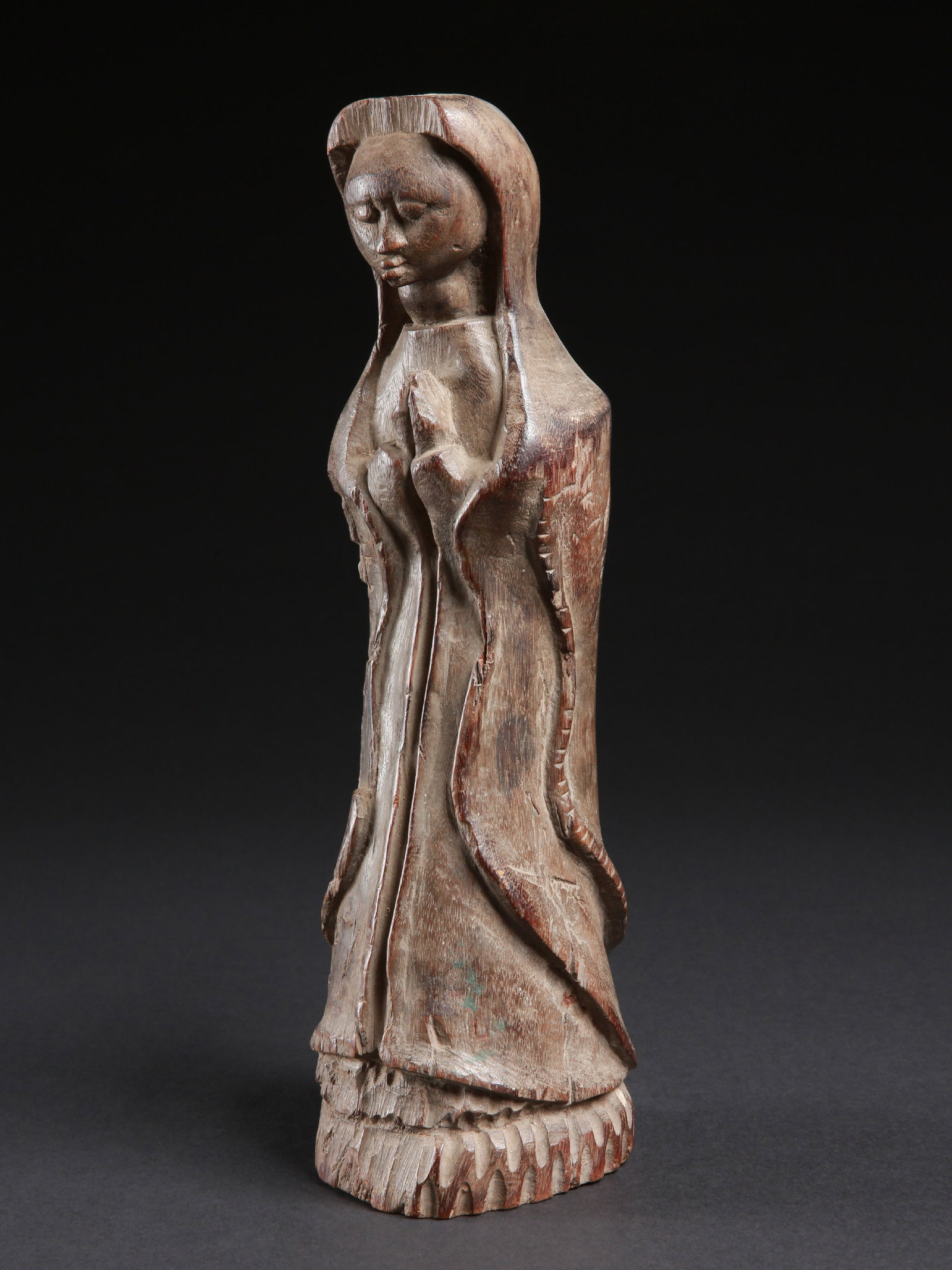 A Luba (?) Christian Votive Figure: Christliche Votivfigur Luba (?). DR Kongo Ohne Sockel / without base Holz. H 36 cm. Provenienz: - Edmond (Edi) Remondino, Burundi und Zürich. - Schweizer Privatsammlung, Zürich (1995). Die A