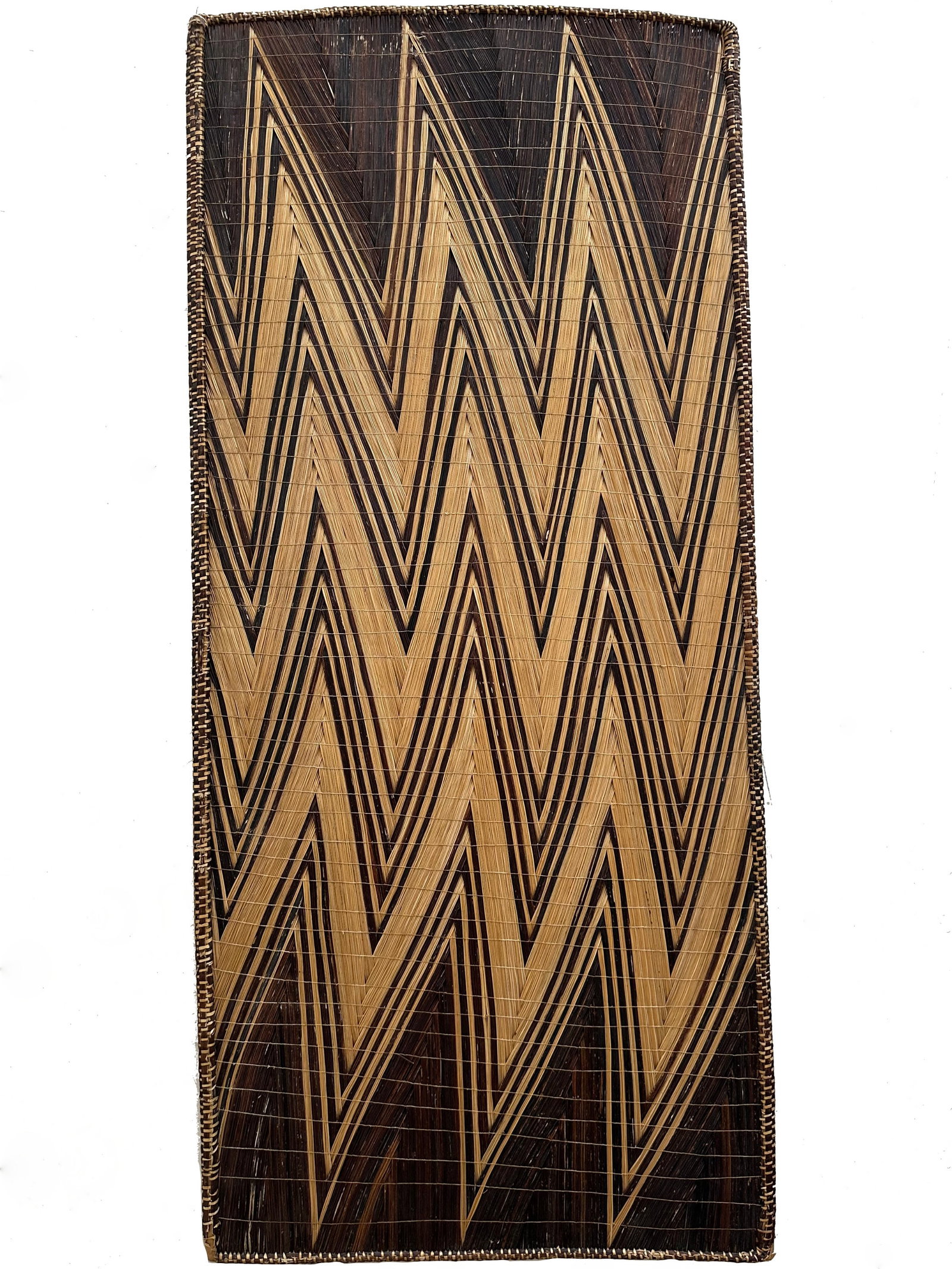A Tutsi Screen, "insika" (African Art): Sichtschutz, Wandpaneel, "insika" Tutsi. Ruanda / Burundi Ohne Sockel / without base Rattan, Grasfaser. B 57 cm. L 128 cm. Provenienz: französische Privatsammlung. CHF 2 000 / 4 000