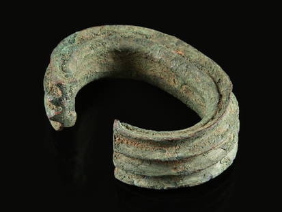 A Gabun Bronze Bangle, Pre-Coinage Currency: Schmuckreif, Vormünzliches Zahlungsmittel Gabun (?) Ohne Sockel / without base Kupfer. B 14.5 cm. Provenienz: - Schweizer Privatsammlung, Zürich. - Hammer Auktionen, Basel, 07.03.2025, Lot 3