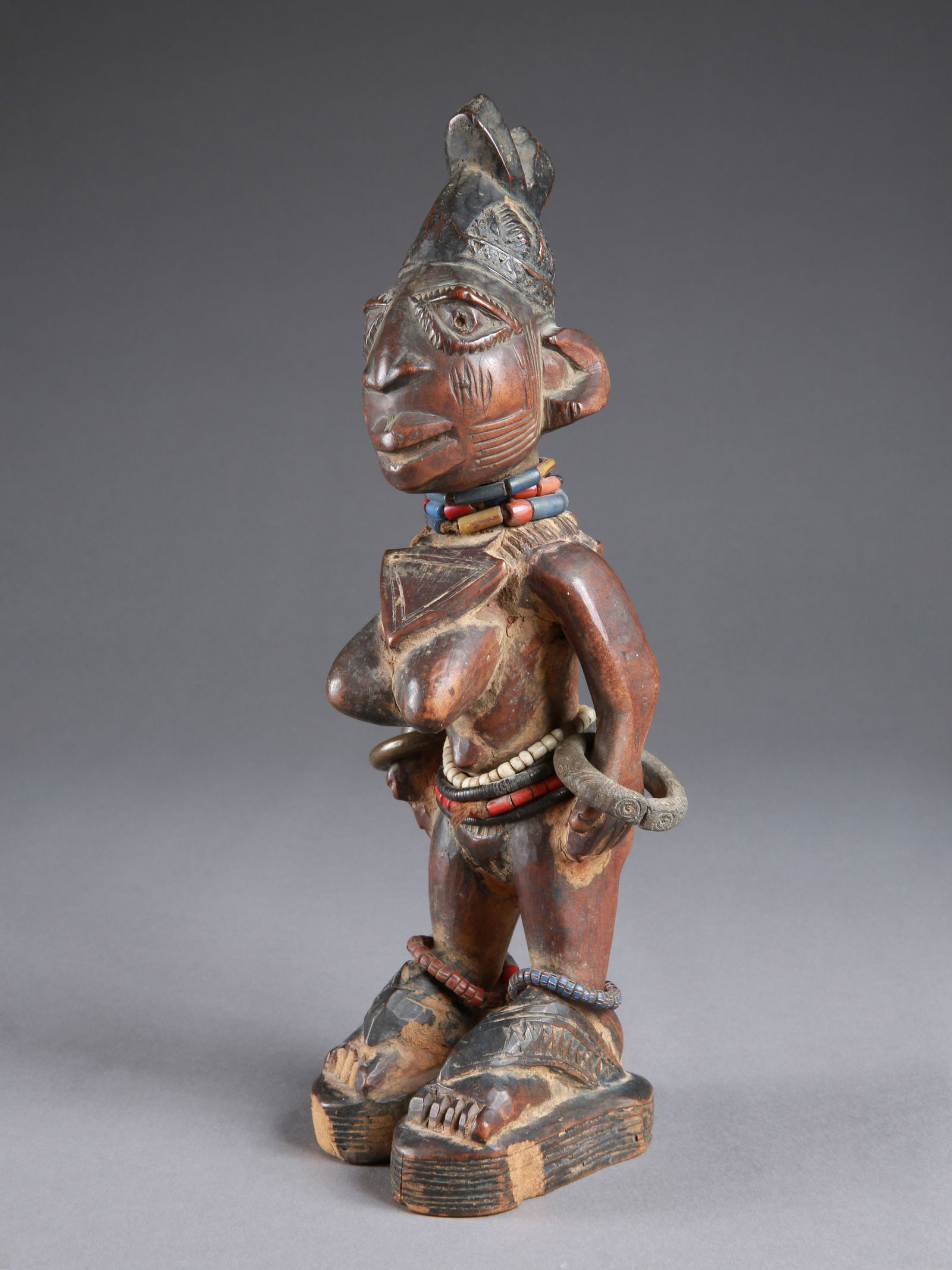 A Yoruba Twin Figure, "ere ibeji" (1 of 10)