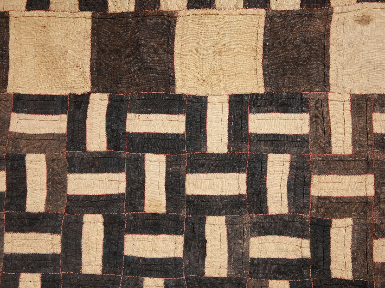 A Kuba Woven Fabric, ceremonial Overskirt, "ncaka kot": Wickelgewand, "ncaka kot" Kuba / Bushoong. DR Kongo Ohne Sockel / without base Raphia. B 61 cm. L 462 cm. Provenienz: - Galerie Walu, Zürich. - Galerie Walu Auktion, Zürich (30.11.2002, Lot