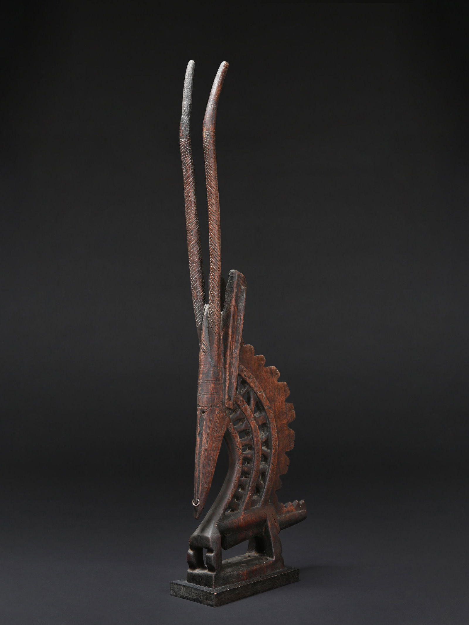 A Bamana Headdress, Handycraft: Kopfaufsatz, "tjiwara", Kunstgewerbe Bamana. Mali, Ségou Mit Sockel / with base Holz. H 93 cm. Provenienz: - Emil Storrer (1917-1989), Galerie Storrer, Zürich. - vor 1969: Hermann Alfred Sigg (1924-