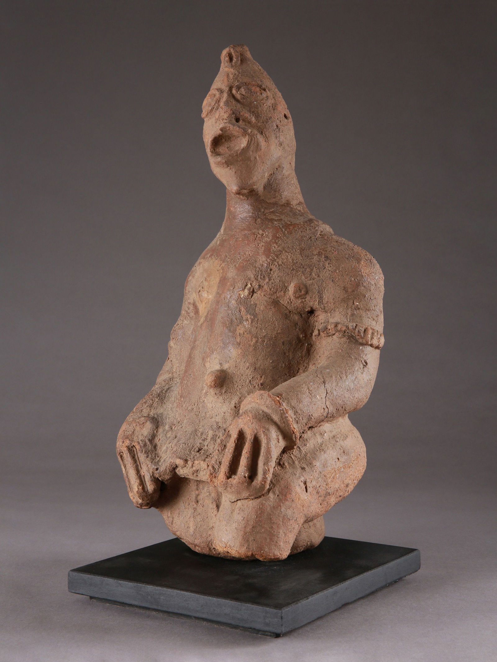 A heavily restored Koma-Bulsa seated Figure, “kronkronbua (1 of 16)