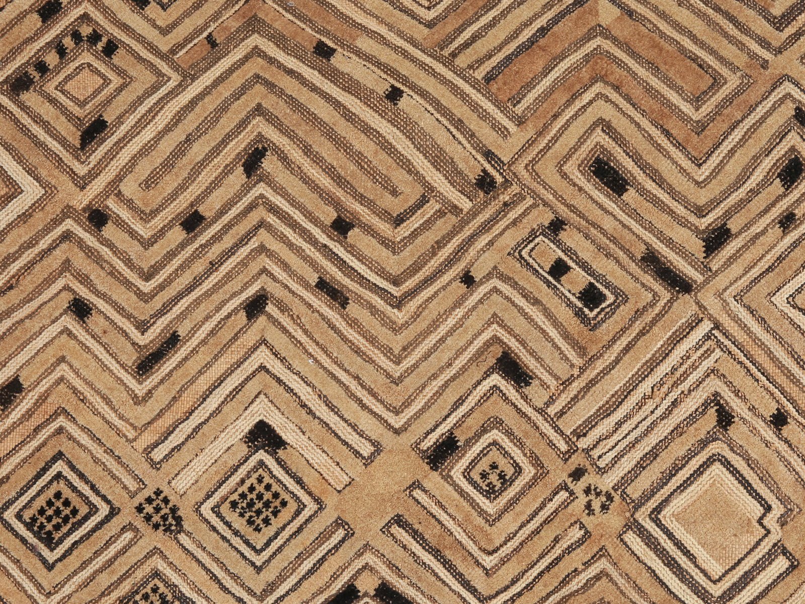 A Shoowa Embroidered Raffia Textile Panel, "mbal": Raphia-Plüschgewebe, "mbal" Kuba / Shoowa. DR Kongo Ohne Sockel / without base Raphia. B 61 cm. L 65 cm. Provenienz: Laurence und Jean-Pierre Boillod (1929-2007), Areuse. Eine bemerkenswerte
