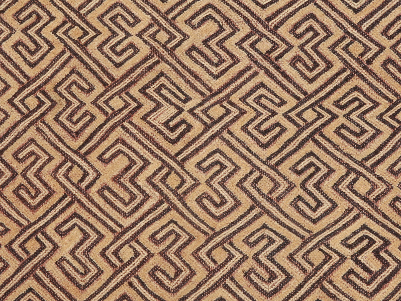 A Shoowa Embroidered Raffia Textile Panel, "mbal": Raphia-Plüschgewebe, "mbal" Kuba / Shoowa. DR Kongo Ohne Sockel / without base Raphia. B 47 cm. L 53 cm. Provenienz: Laurence und Jean-Pierre Boillod (1929-2007), Areuse. Eine bemerkenswerte