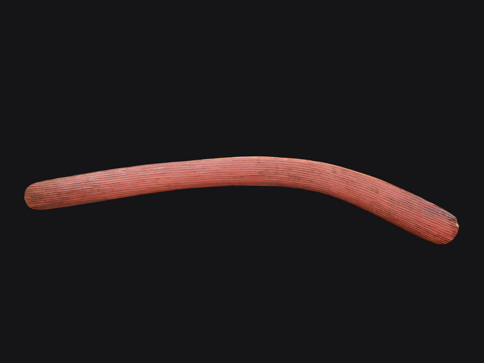 An Australian Boomerang: Bumerang Australien Ohne Sockel / without base Holz. L 70 cm. Provenienz: Schweizer Privatsammlung, Genf. CHF 100 / 200