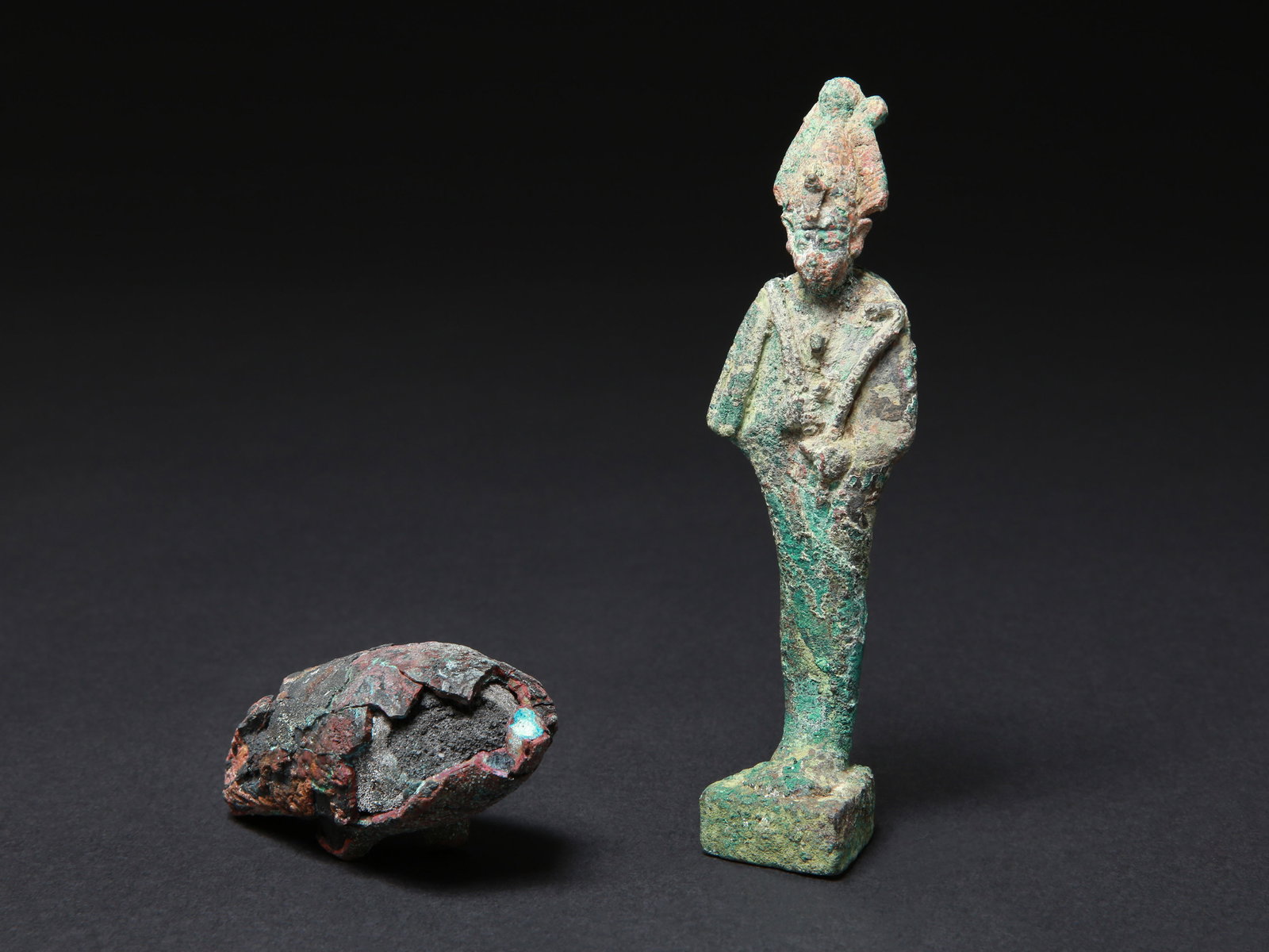 A Bronze Statuette of Osiris and a Fragment of an Ibis: Bronze-Statuette des Osiris und Ibis-Fragment Ägypten Ohne Sockel / without base Kupferlegierungen. H 8,5 - 14 cm. Provenienz: - Museum Bally-Prior, Schönenwerd. - Schweizer Privatsammlung,
