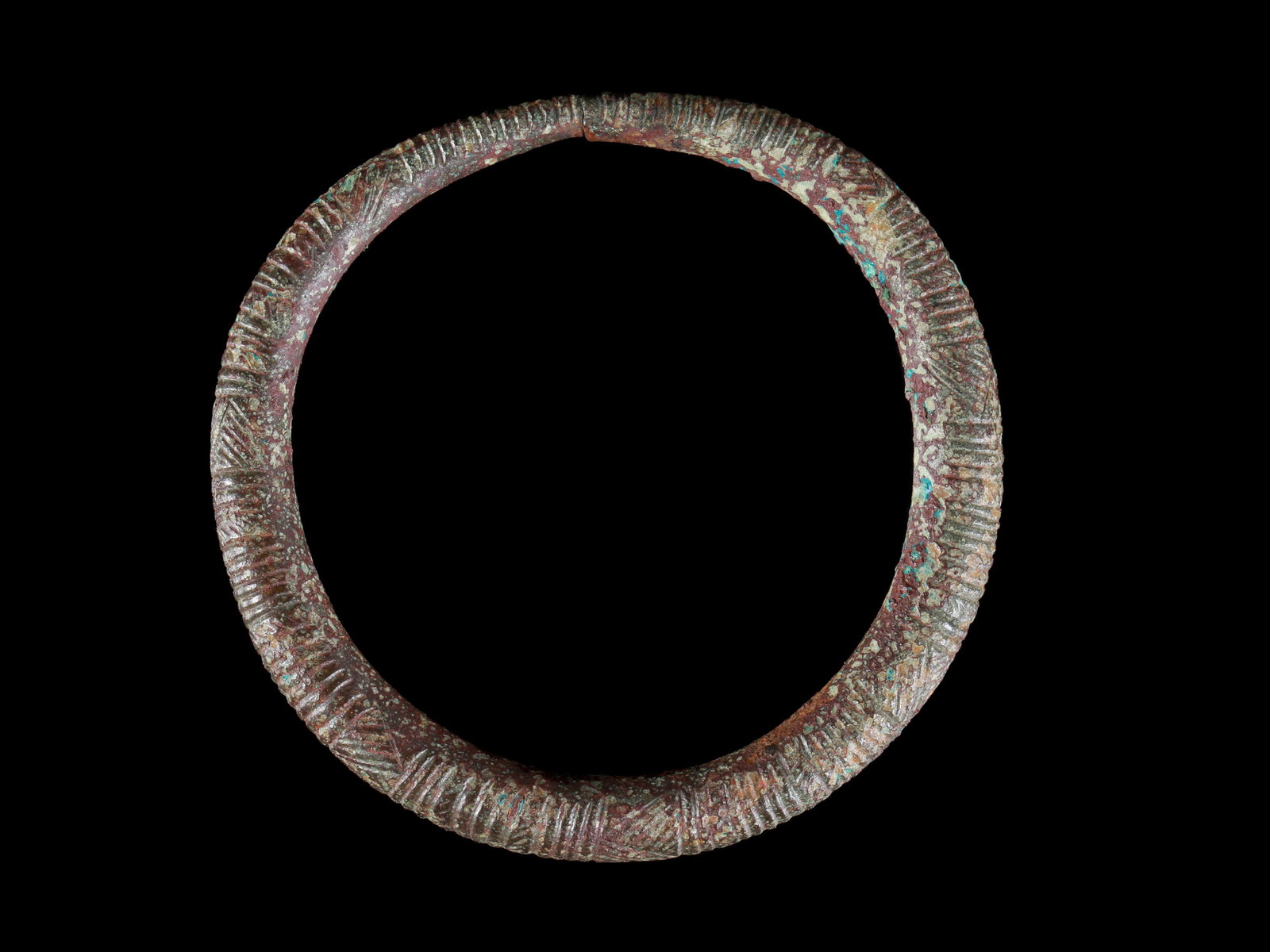 An Italic Bracelet: Armreif Italisch Ohne Sockel / without base Kupferlegierung. Ø 8 cm. Provenienz: - Wilhelm Dörpfeld (1853-1940). - Ernst Grumach (1902-1967), Berlin. - Gorny & Mosch, München