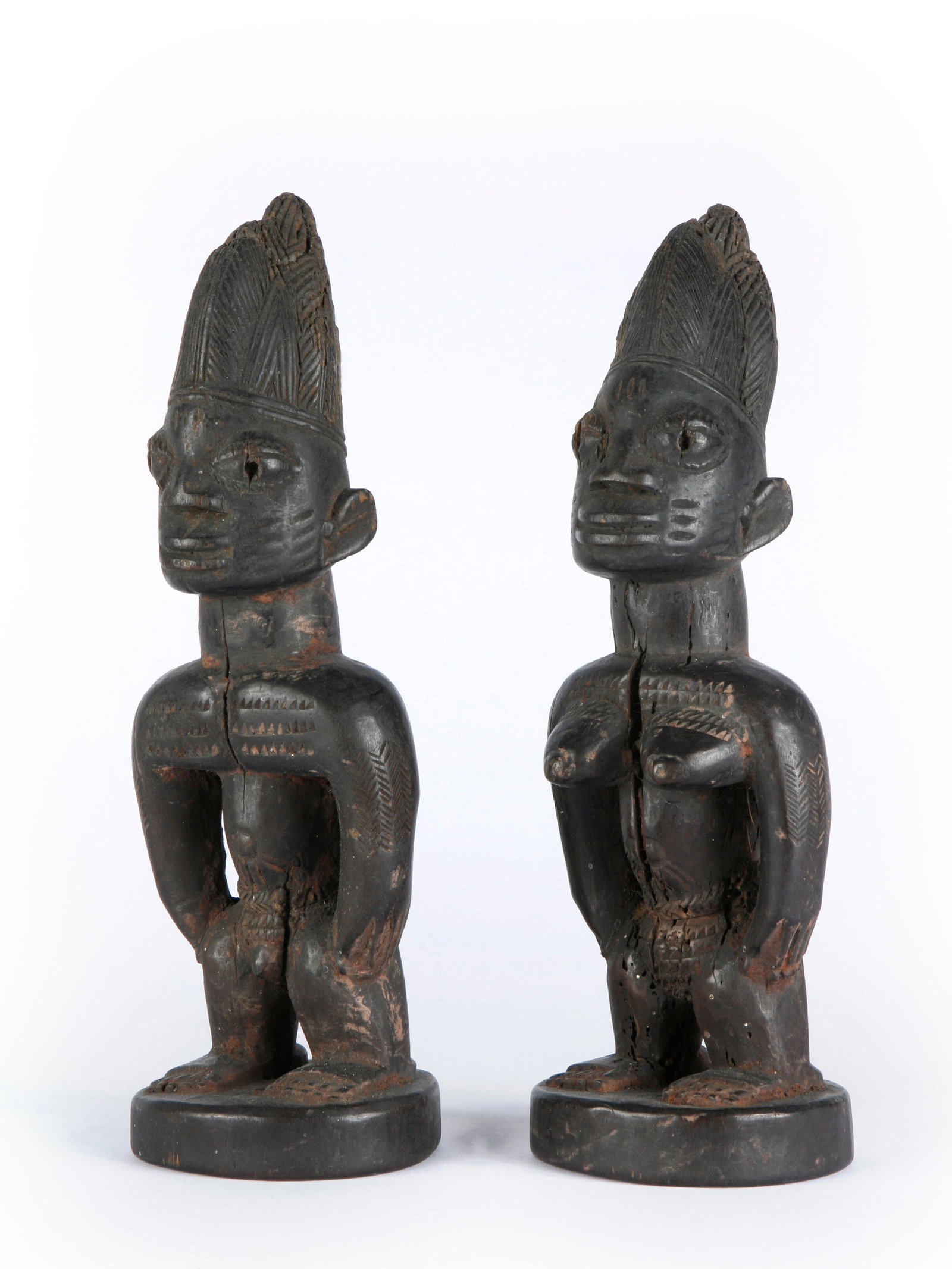 A Yoruba Pair of Twin Figures, "ere ibeji" (1 of 8)