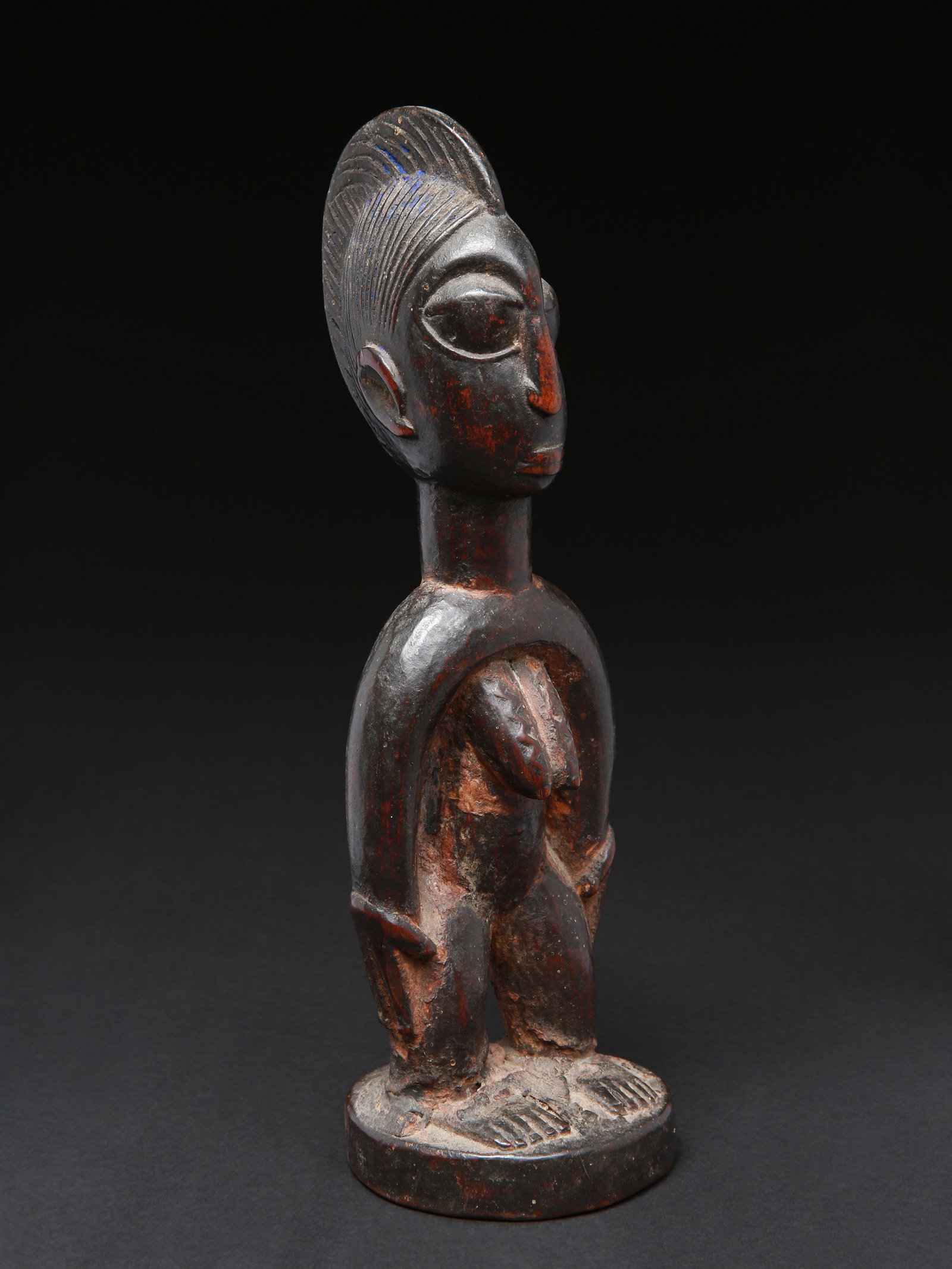 A Yoruba Twin Figure, "ere ibeji" (1 of 9)