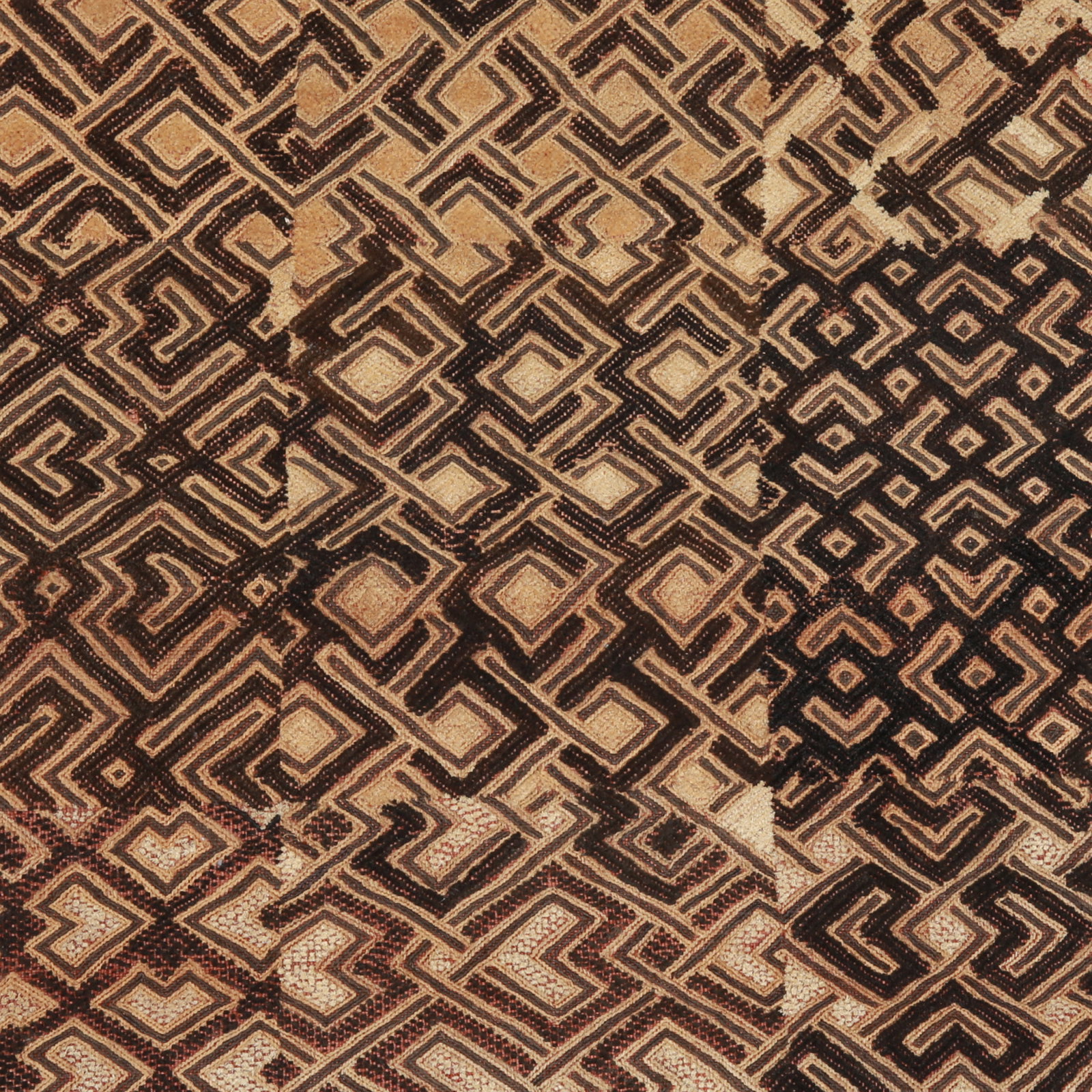 A Kuba Textile Prestige Panel and Currency, "mbal": Raphia-Plüschgewebe, "mbal" Kuba-Shoowa. DR Kongo Ohne Sockel / without base Raphia. B 51 cm. L 54 cm. Provenienz: Laurence und Jean-Pierre Boillod (1929-2007), Areuse. Eine bemerkenswerte