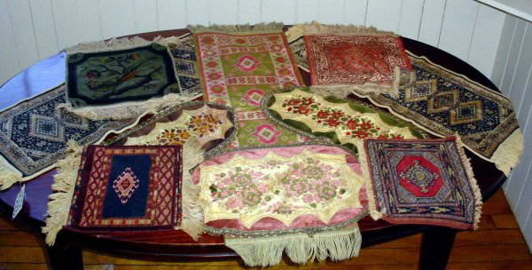 GROUPING OF 10 VARIOUS TABLE RUNNER RUGS 13726: Grouping of 10 various table runners.Dimension: Various Sizes Age: C. 1900 Material: Cloth & Rug