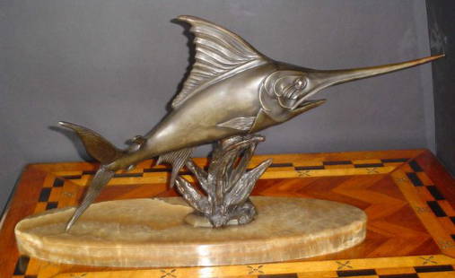 FISH ON MARBLE BASE 13872: Outstanding fish on marble base. Artist signed: M. Leducq. Dimensions: 15.5"H x 27"W x 10.5"D Age: C. 1920 Material: Marble & spelter