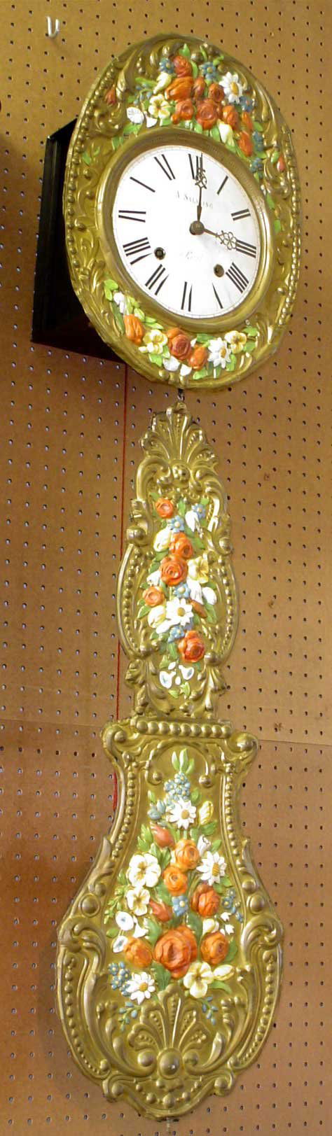 PAINTED WALL CLOCK WITH LG PTD PENDULLUM 14113: All original painted wall clock with two iron weights and large painted pendulum. Dimensions: 53" H x 13" W x 6" D Age: 1860 Material: Brass