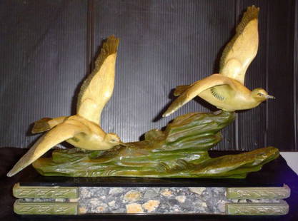 ART DECO TWO BIRDS ON MARBLE BASE 11998: Unique art deco statue with two birds on marble base. Dimensions: 14" H x 18 1/4" L x 9" W Age: C. 1920 Material: White Metal & Marble