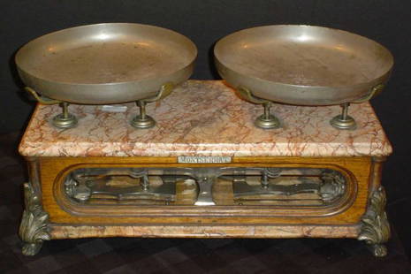 ANTIQUE MONSTERRAT OAK AND MARBLE SCALE 1586: Marvelous oak and marble scale with beveled glass. Marked: Monsterrat. Dimensions: 10 1/2" H x 22" W x 11" D Age: C. 1910 Material: Oak & Marble